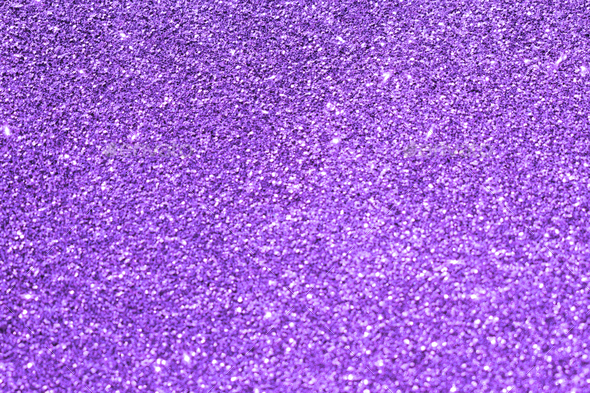 Purple violet shiny light glitter background.